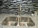 Close up shot of the kitchen sink with granite countertops and decorative backsplash at 3086 Lone Oak Sw Ave, Atlanta, GA 30354