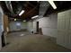 Unfinished basement area with exposed ductwork and concrete flooring, ready for customization at 3195 Vickery Dr, Marietta, GA 30066