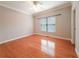 Bedroom with hardwood floors, window, and neutral paint at 3195 Vickery Dr, Marietta, GA 30066