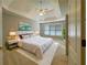 A spacious bedroom features a trey ceiling, neutral colors and plush bedding at 3195 Vickery Dr, Marietta, GA 30066
