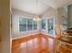 Bright eat-in kitchen with hardwood floors, table, chairs, and natural light at 3195 Vickery Dr, Marietta, GA 30066