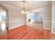 Open dining room showcasing hardwood floors, decorative lighting, and an open floor plan at 3195 Vickery Dr, Marietta, GA 30066