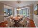 Formal dining room with a large table and bay window at 3195 Vickery Dr, Marietta, GA 30066