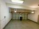 Two-car garage with overhead lighting, perfect for parking and storage at 3195 Vickery Dr, Marietta, GA 30066