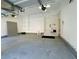 Clean and spacious garage with storage cabinets and painted walls, ideal for organization at 3195 Vickery Dr, Marietta, GA 30066