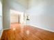 Open-concept living area with hardwood floors and a view into the dining room at 3195 Vickery Dr, Marietta, GA 30066