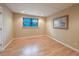 Small room featuring wood floors, a small window for natural light, and modern recessed lighting at 3195 Vickery Dr, Marietta, GA 30066