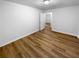 Cozy bedroom with light walls and modern flooring, ready for personalization at 355 Marietta Hwy, Roswell, GA 30075