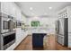 Well-equipped kitchen with stainless steel appliances, a center island, and plenty of cabinet space for storage at 230 Summerhouse Ln, Atlanta, GA 30350
