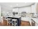 Gourmet kitchen features a large island, stainless steel appliances, and custom cabinetry for a modern look at 230 Summerhouse Ln, Atlanta, GA 30350