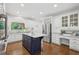 Beautiful kitchen with stainless steel appliances, custom cabinets, and a functional island perfect for cooking and entertaining at 230 Summerhouse Ln, Atlanta, GA 30350