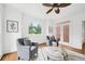 Relaxing sitting room with comfortable armchairs, decorative pillows, and a scenic outdoor view at 230 Summerhouse Ln, Atlanta, GA 30350