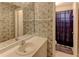 Bathroom features a single sink vanity and wallpaper with view of the toilet with purple shower curtain at 3252 Abbeywood Dr, Decatur, GA 30034