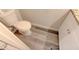 A newly renovated bathroom featuring a white toilet, gray flooring, and updated vanity at 3252 Abbeywood Dr, Decatur, GA 30034