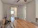 The dining room features a wooden table and gray chairs with an open view into the living room at 3252 Abbeywood Dr, Decatur, GA 30034