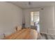The dining room features a wooden table and gray chairs with an open view into the living room at 3252 Abbeywood Dr, Decatur, GA 30034
