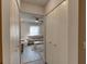Hallway with a closet and an open view into the living room and ceiling fan at 3252 Abbeywood Dr, Decatur, GA 30034
