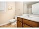 Well-lit bathroom featuring tile floors, a single sink vanity, and a shower at 4889 Arbor View Nw Pkwy, Acworth, GA 30101