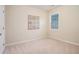 Comfortable bedroom with neutral carpet and a window at 4889 Arbor View Nw Pkwy, Acworth, GA 30101