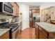 Kitchen with granite countertop island and stainless steel appliances at 4889 Arbor View Nw Pkwy, Acworth, GA 30101
