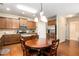 Kitchen with eat-in breakfast area, stainless appliances, and hardwood floors at 4889 Arbor View Nw Pkwy, Acworth, GA 30101