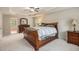 Comfortable main bedroom showcasing ample space, neutral tones, and classic furniture at 4889 Arbor View Nw Pkwy, Acworth, GA 30101