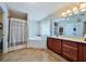 Bright bathroom featuring tile floor, tub, standalone shower, and double vanity at 176 Oakland Way, Dallas, GA 30157