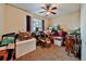 Bedroom presents ample potential for personalization, enhanced by natural light and a ceiling fan at 176 Oakland Way, Dallas, GA 30157
