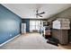 Bedroom with blue accent wall, ceiling fan and large window allowing plenty of light at 176 Oakland Way, Dallas, GA 30157