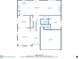 Detailed floor plan showcasing layout of the first floor, including kitchen, living room, and garage at 176 Oakland Way, Dallas, GA 30157