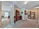 Spacious hallway with carpeted floors, light walls, and decor at 176 Oakland Way, Dallas, GA 30157
