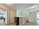 Carpeted upstairs hallway leads to a staircase and another room at 176 Oakland Way, Dallas, GA 30157