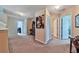 Upstairs hallway with neutral walls, carpet and white doors at 176 Oakland Way, Dallas, GA 30157