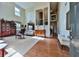 Inviting living room with tall ceilings and a mix of carpet and hardwood floors at 176 Oakland Way, Dallas, GA 30157