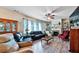 Inviting living room with hardwood floors, plush seating, and a fireplace offers an ideal gathering space at 176 Oakland Way, Dallas, GA 30157