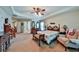 Spacious main bedroom with tray ceiling, ceiling fan and large windows providing plenty of natural light at 176 Oakland Way, Dallas, GA 30157