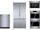 Sleek stainless steel kitchen appliances including a refrigerator, microwave, double ovens, and dishwasher at 2200 Upper Burris Rd, Canton, GA 30114