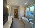 A modern bathroom with a soaking tub, walk-in shower, black fixtures, and plenty of space at 2200 Upper Burris Rd, Canton, GA 30114