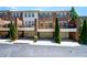 Townhome complex with attached garages and manicured landscaping at 2828 Broughton Se Ln, Atlanta, GA 30339