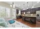 Modern kitchen with stainless steel appliances, granite countertops, and seating at the island at 2828 Broughton Se Ln, Atlanta, GA 30339