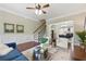 Bright living room with hardwood floors, ceiling fan, and stylish furniture arrangement at 2828 Broughton Se Ln, Atlanta, GA 30339