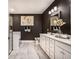 Elegant bathroom with double sinks, a glass-enclosed shower, and sophisticated decorations at 3351 Orwell Way # 2305, Cumming, GA 30041