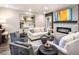 Bright living room with stone fireplace, comfortable seating, modern decor, and accent mirrors at 3351 Orwell Way # 2305, Cumming, GA 30041