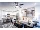 A modern living space with an open-concept layout, stylish decor, and a ceiling fan at 3351 Orwell Way # 2305, Cumming, GA 30041