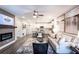 Stylish living space with fireplace, open layout to kitchen, and modern design elements at 3351 Orwell Way # 2305, Cumming, GA 30041