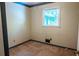 Small, simple bedroom with a window providing natural light at 4370 Tradition Ter, Austell, GA 30106