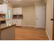 Bright kitchen with laminate floors, and sleek countertops at 4370 Tradition Ter, Austell, GA 30106
