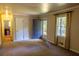 Inviting living room featuring neutral walls, carpeting, and natural light at 4370 Tradition Ter, Austell, GA 30106