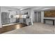 Basement kitchenette featuring stainless steel appliances, gray cabinets, and granite countertops at 5178 Stefan Ridge Way, Buford, GA 30519
