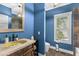 Charming bathroom featuring unique granite countertops, stylish fixtures, and natural light at 5178 Stefan Ridge Way, Buford, GA 30519